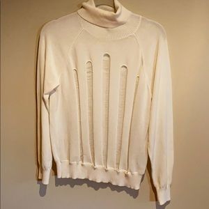 H&M trend distressed sweater.